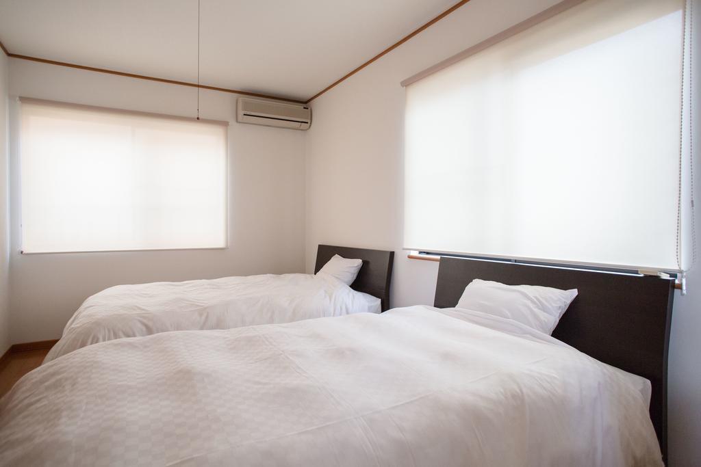 Guesthouse Iloha Киото Экстерьер фото