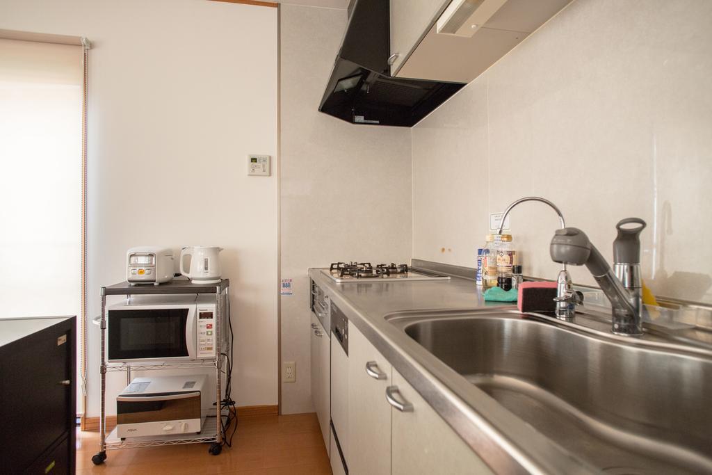 Guesthouse Iloha Киото Экстерьер фото